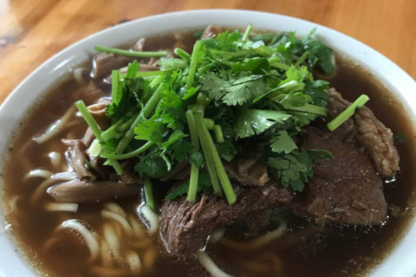 《咬强羊肉面馆加盟费》